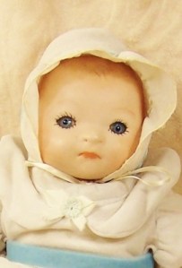 http://www.artfire.com/ext/shop/product_view/vintagetreasuresfound/3434092/baby_doll__bisque_antique_grace_storey_putman_head_germany_cloth_body/vintage/dolls_and_miniatures/human_figure